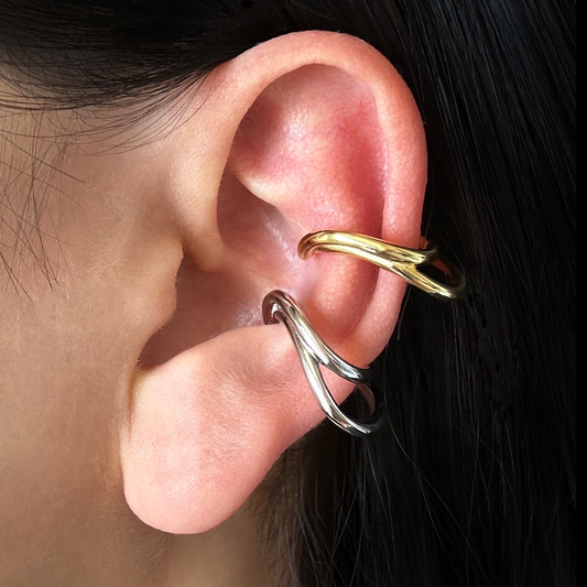 Lady wearing Capri Ear Cuff in gold color and silver color by Deduet