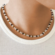 Lady wearing Constance Beaded Necklace by Deduet