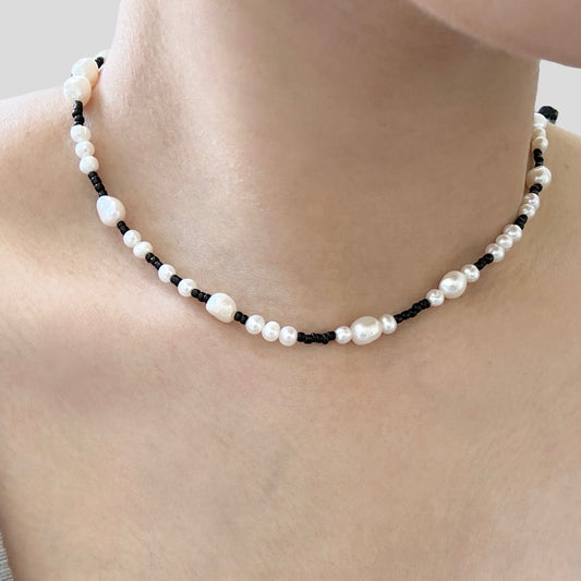 Lady wearing Kaia Pearl Necklace