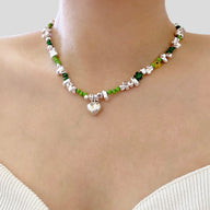 Lady wearing Laurel Heart Pendant Necklace by Deduet