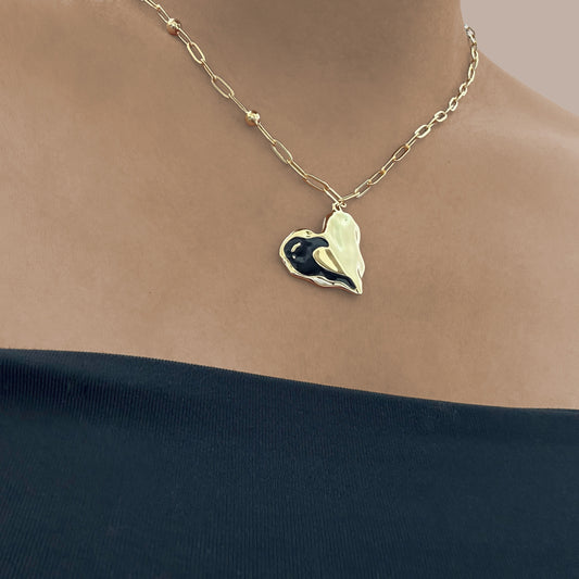 Lady wearing Mae Heart Pendant Necklace by Deduet