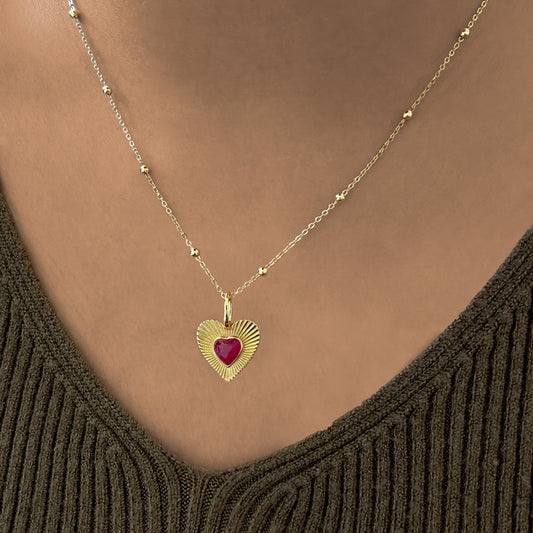 Lady wearing Vada Heart Pendant Necklace by Deduet