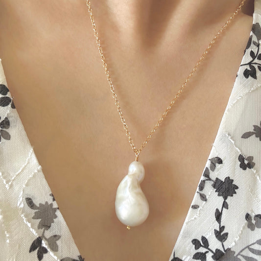 Lady wearing Noelie Large Baroque Pearl Necklace by Deduet