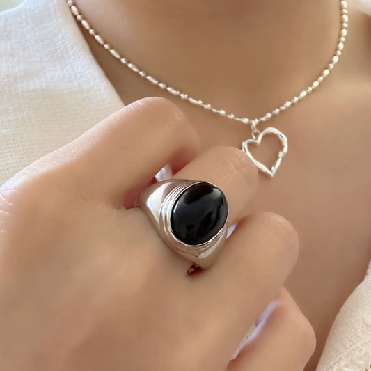 lady-wearing-alicia-adjustable-oval-gemstone-ring-black-onyx