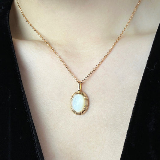 Lady wearing Alicia Oval Gemstone Pendant Necklace in Gold by Deduet