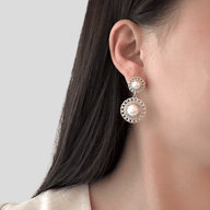 Lady wearing Chrissy Pearl Drop Earrings by Deduet