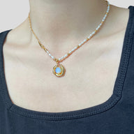 Lady wearing Kaylee Opal Pearl Necklace by Deduet