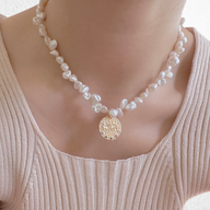 Lady wearing Kiki Pendant Pearl Necklace by Deduet