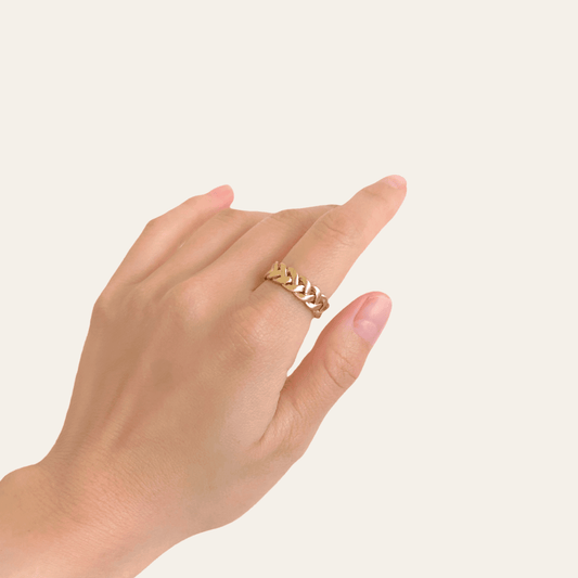 Lady wearing Lila Braided Ring by Deduet