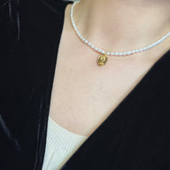 Lady wearing Lucia Pendant Pearl Necklace by Deduet