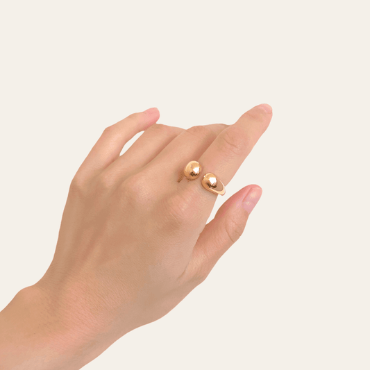 Lady wearing Nora Adjustable Ring in Gold by Deduet