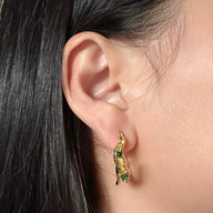 lady-wearing-valerie-gemstone-hoop-earrings-gold